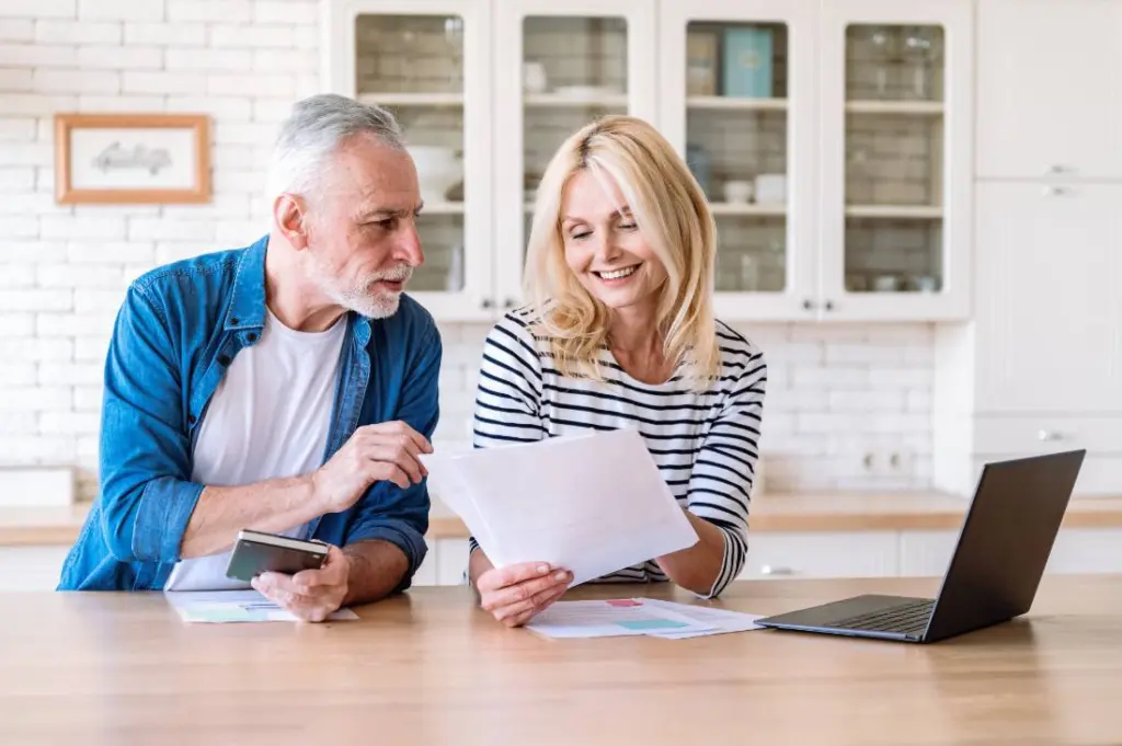 An accountant reviewing documents with clients