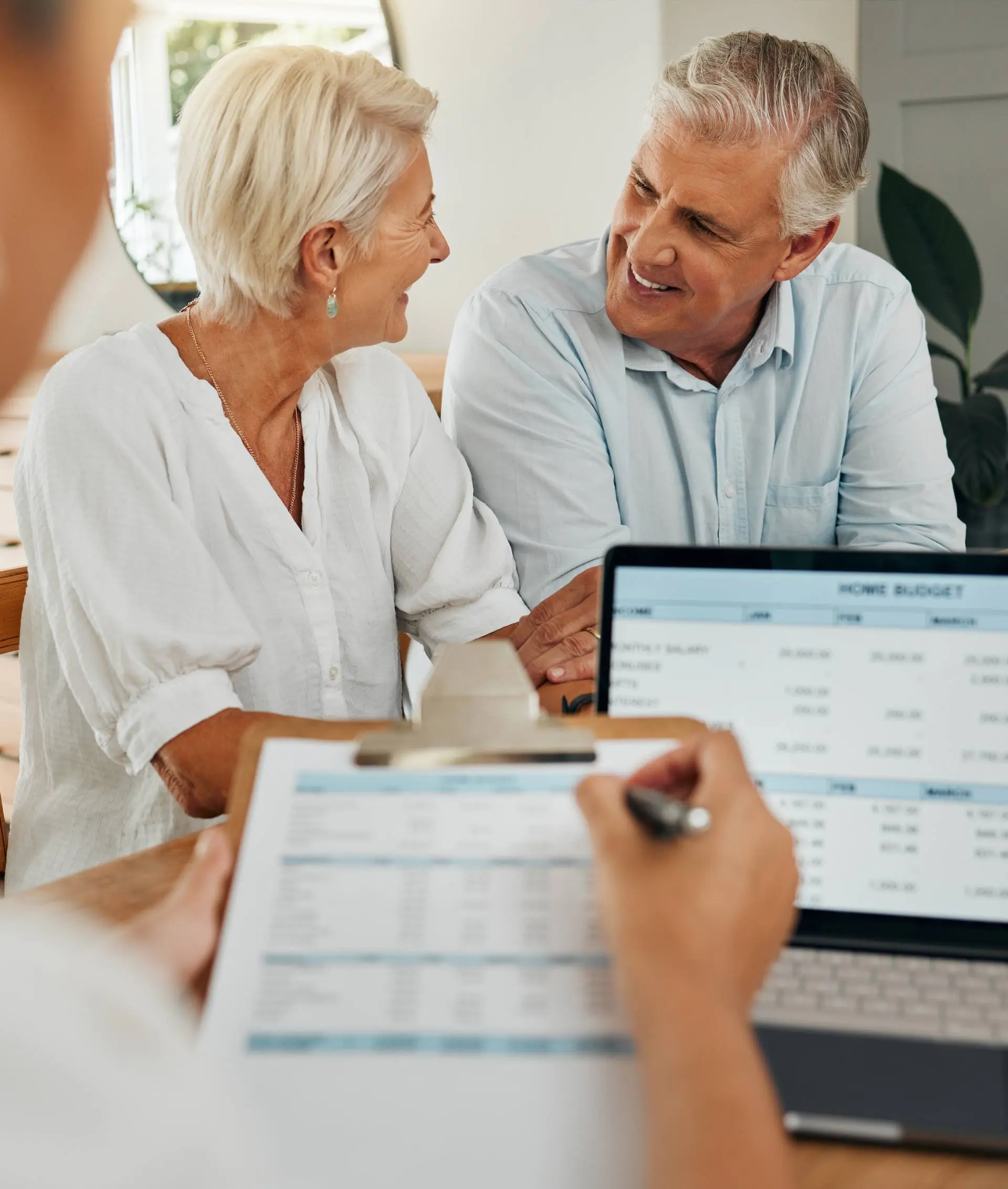 Accountants reviewing a budget with clients
