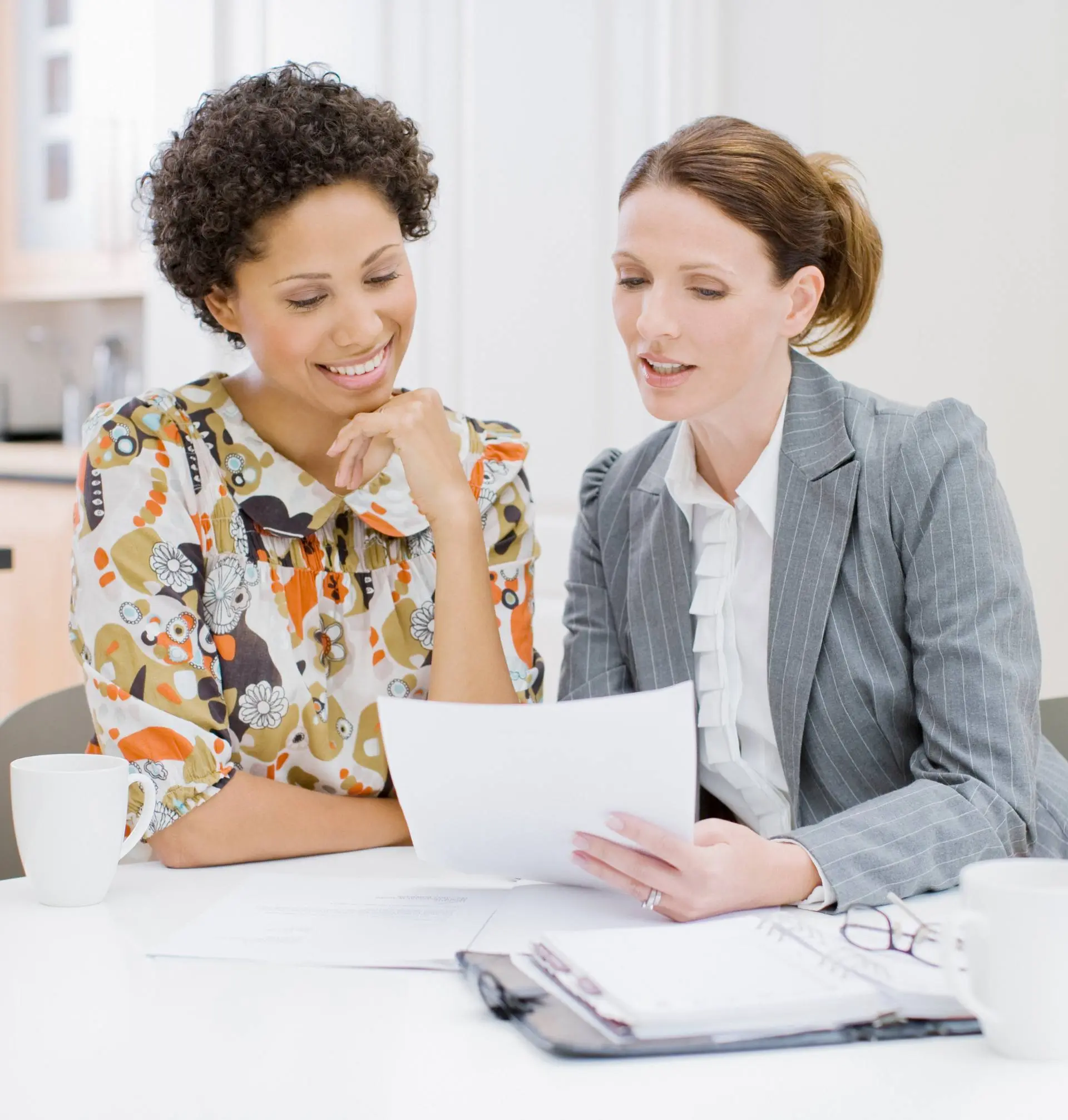 An accountant meeting with individual clients