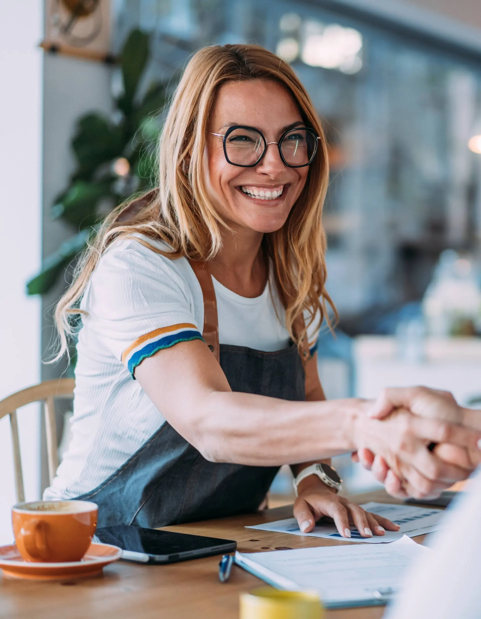 An accountant shaking hands with a client