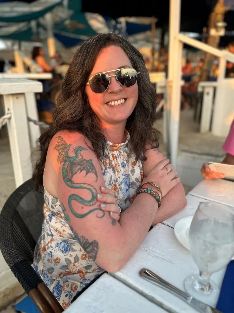 Sarah Bailey smiling at a restaurant table